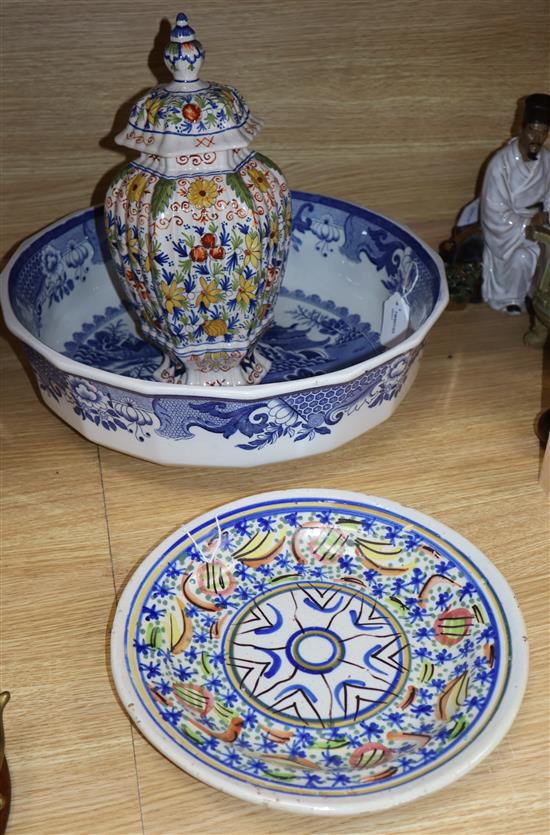 A 19th century Dutch Delft polychrome-decorated vase and cover, LVS mark for Lysbet van Schoonhoven and two other items,